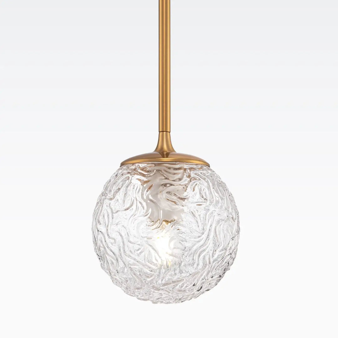 Suspension luminaire ligéro avec globe en verre transparent texturé et monture dorée style art déco
