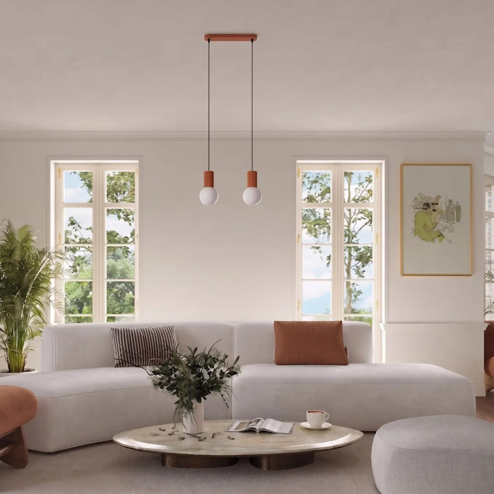 Suspension Halo ocre rouge en ligne à globes opalins dans un intérieur contemporain
