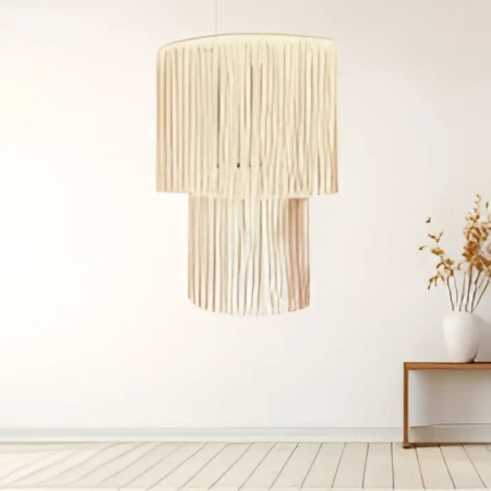 Suspension luminaire hasley beige en macramé avec design cylindrique à étages en matières naturelles style bohème