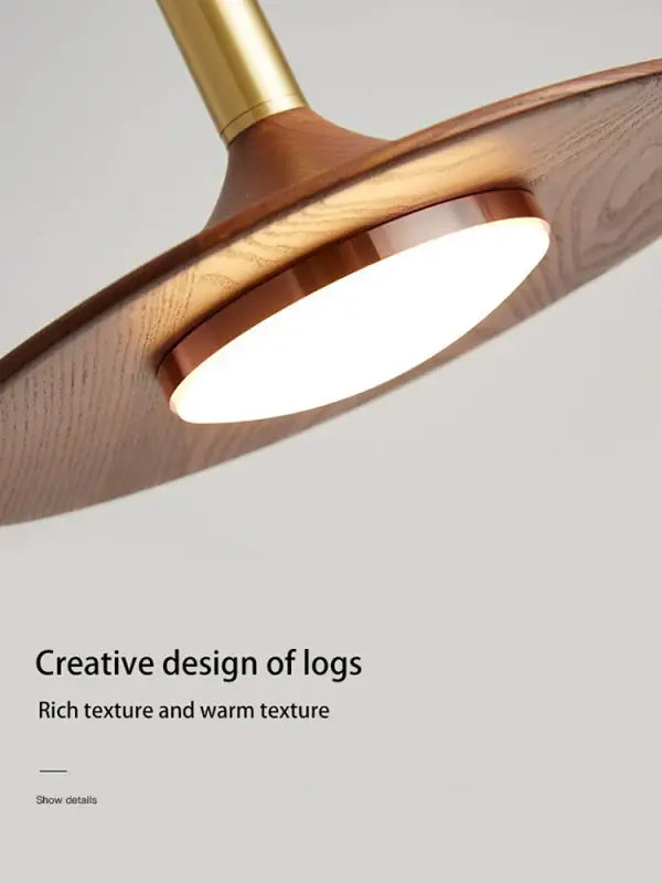Suspension luminaire contemporaine au design élancé en metal

