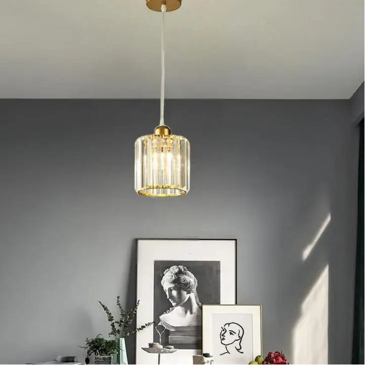 Suspension luminaire cristal doré et noir cylindrique élégant

