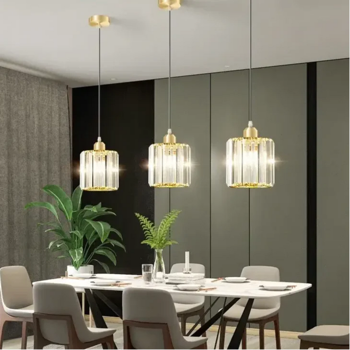 Suspension luminaire cristal doré et noir cylindrique élégant

