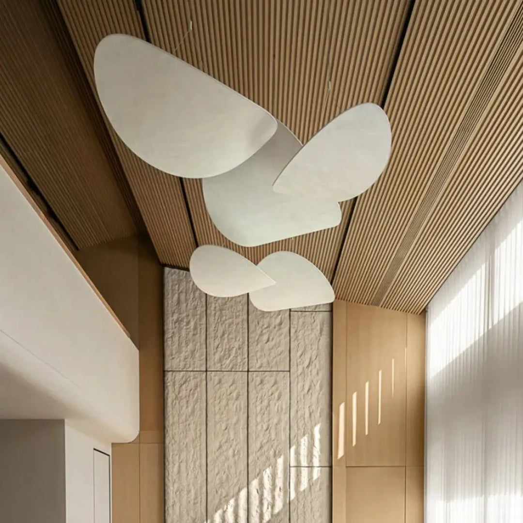 Suspension luminaire design blanc mat formes galets moderne