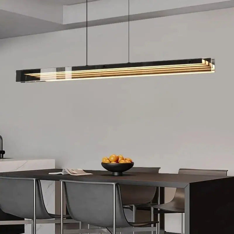 Suspension luminaire design moderne allongée finition dorée noir