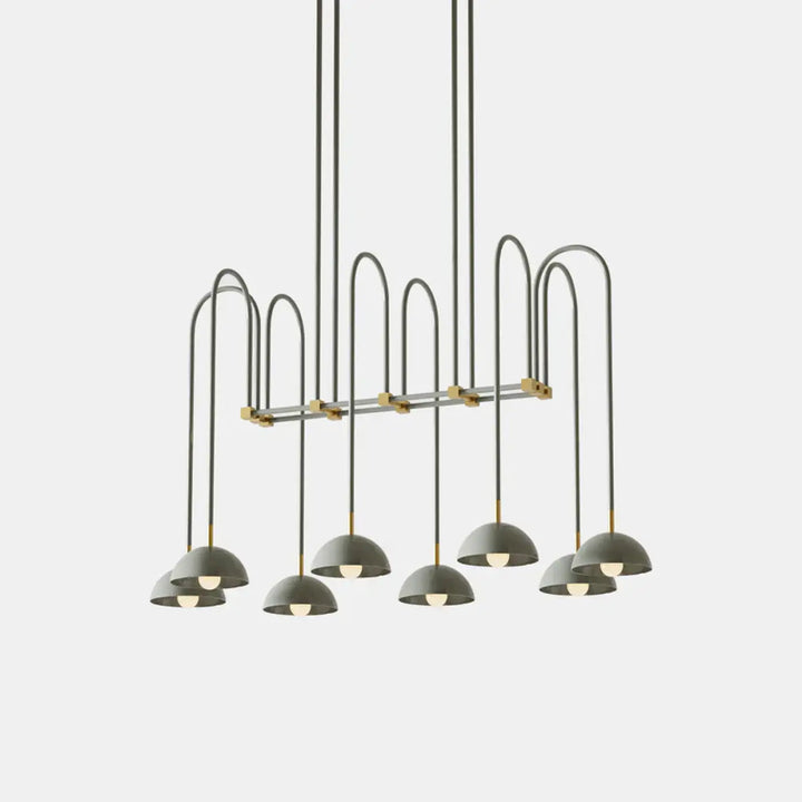 Suspension luminaire rumia design moderne avec finition gris mat et accents en laiton pour une présence spectaculaire