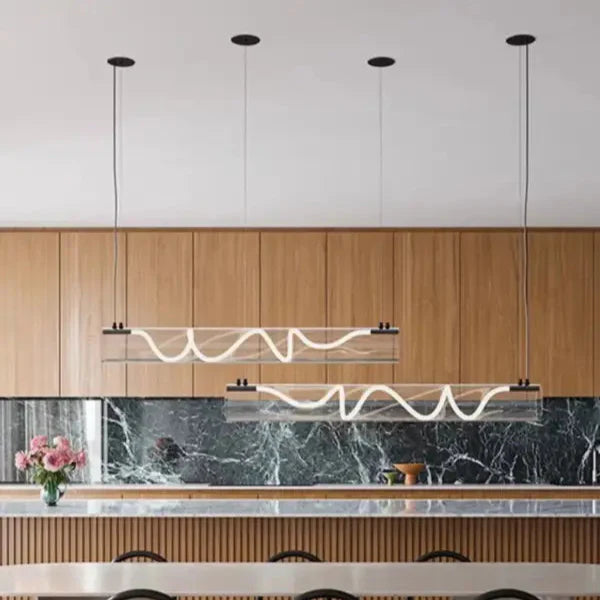 Suspension luminaire design tube en verre et LED torsadée

