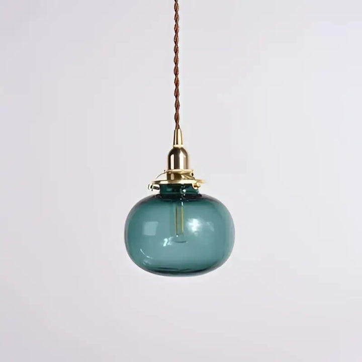 Suspension luminaire design verre et base dorée élégance moderne