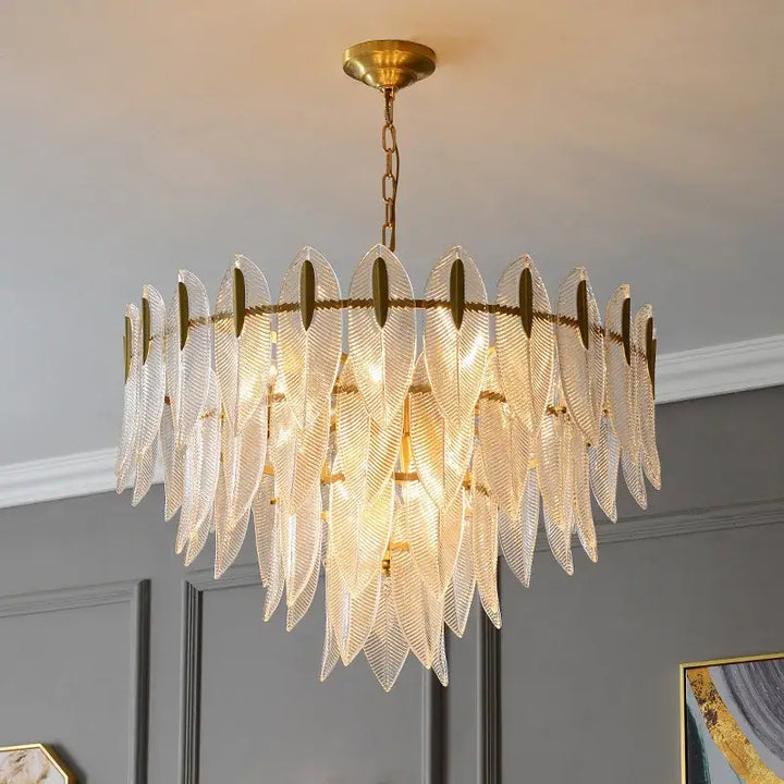 Suspension luminaire dorée en verre sculpté style art déco chic