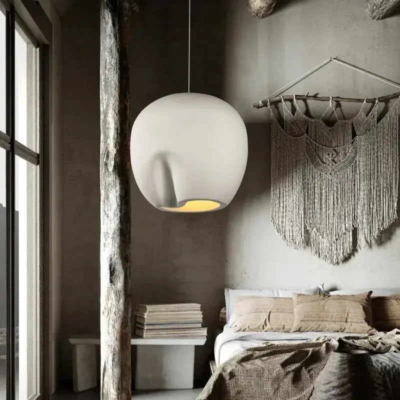 Suspension luminaire en forme sphérique pliée d’un côté