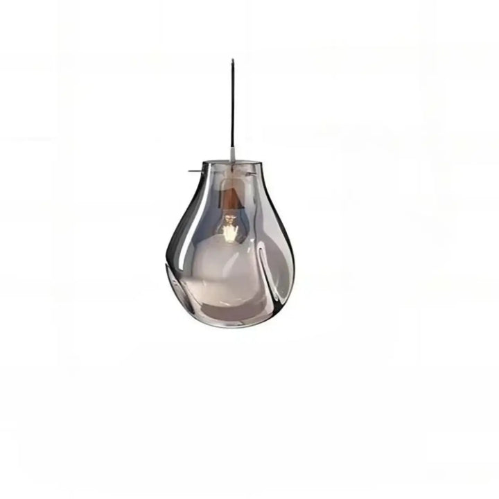 Suspension luminaire vulco avec abat-jour en verre gris translucide et ampoule à filament visible, forme goutte d’eau élégante