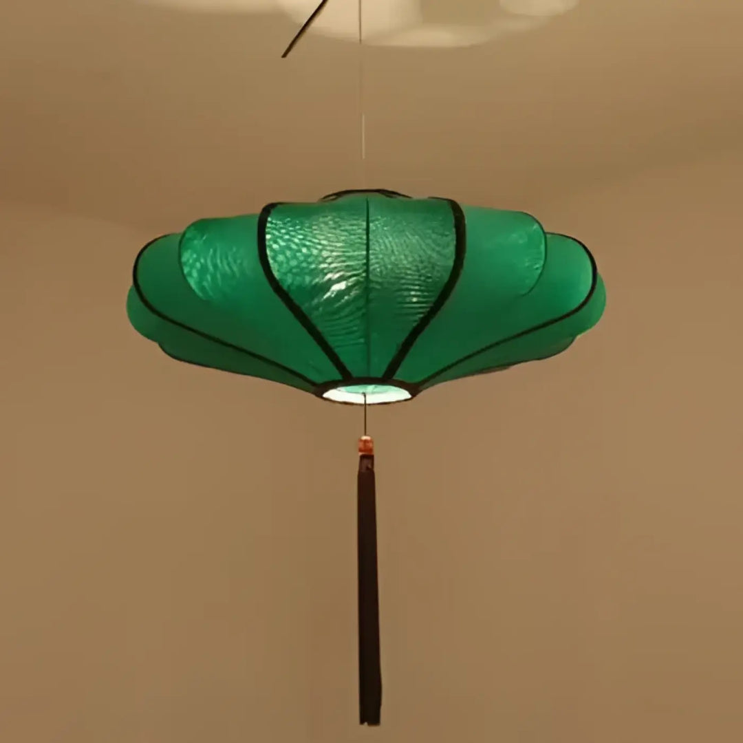 Suspension luminaire sanga vert plissé avec franges élégantes noires et tassel suspendu comme objet décoratif