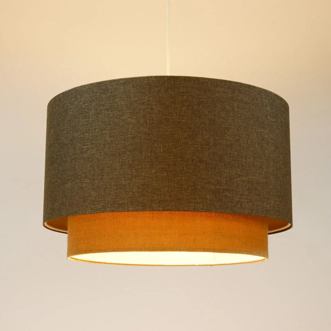 Suspension luminaire marron gris duo boho élégant avec abat-jour texturé gris et intérieur doré lumineux