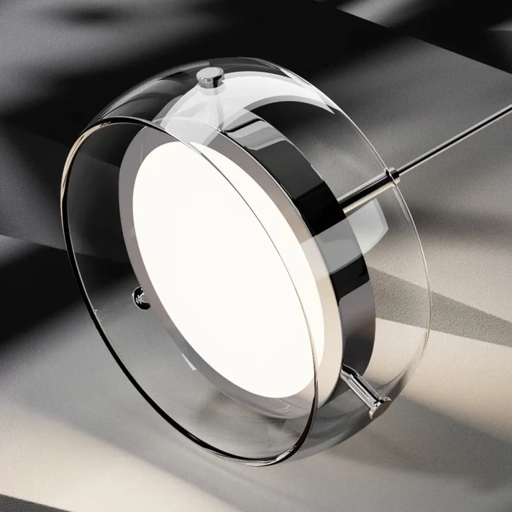 Suspension luminaire simpa en chrome moderne avec abat-jour circulaire en verre clair et design minimaliste élégant