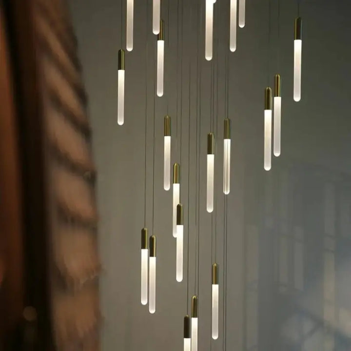 Suspension luminaire minimaliste à tubes lumineux suspendus chic