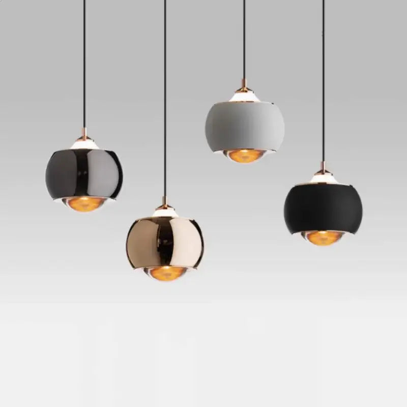 Suspension luminaire moderne boule métal noir et doré chic
