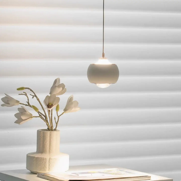 Suspension luminaire moderne boule métal noir et doré chic