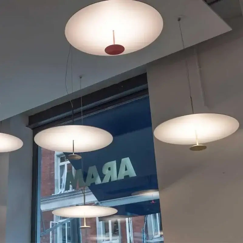 Suspension luminaire moderne avec une silhouette de disque plat

