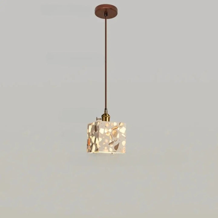 Suspension luminaire tosco avec abat-jour carré en terrazzo or et brun suspendue par une chaîne cordon réglable bronze