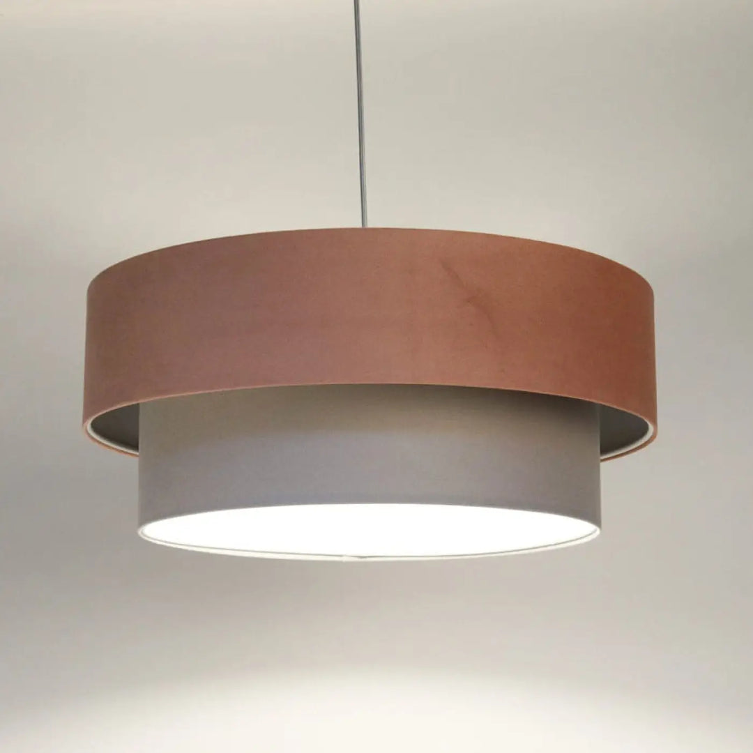 Suspension luminaire duo jasmin avec anneau extérieur cuivre chaud et abat-jour gris mat intérieur suspendue par chaîne métallique fine