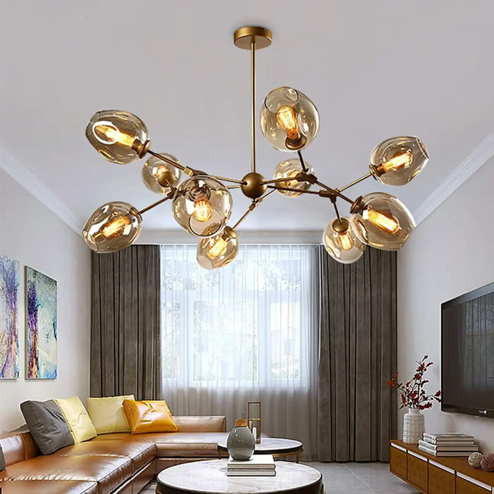 Suspension luminaire alloy en métal doré avec globes en verre ambre et bras articulés vintage à ampoules à filament exposé