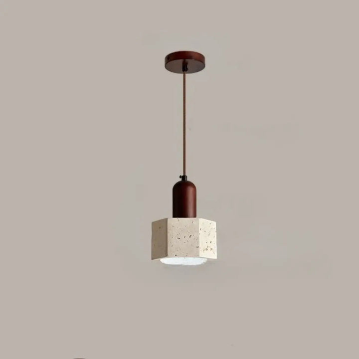 Suspension luminaire kreto avec abat-jour hexagonal en béton texturé ivoire et accents métalliques bronze foncé travertin aux lignes