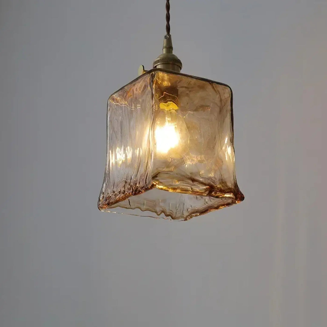 Suspension luminaire en verre ambré au design rétro chic