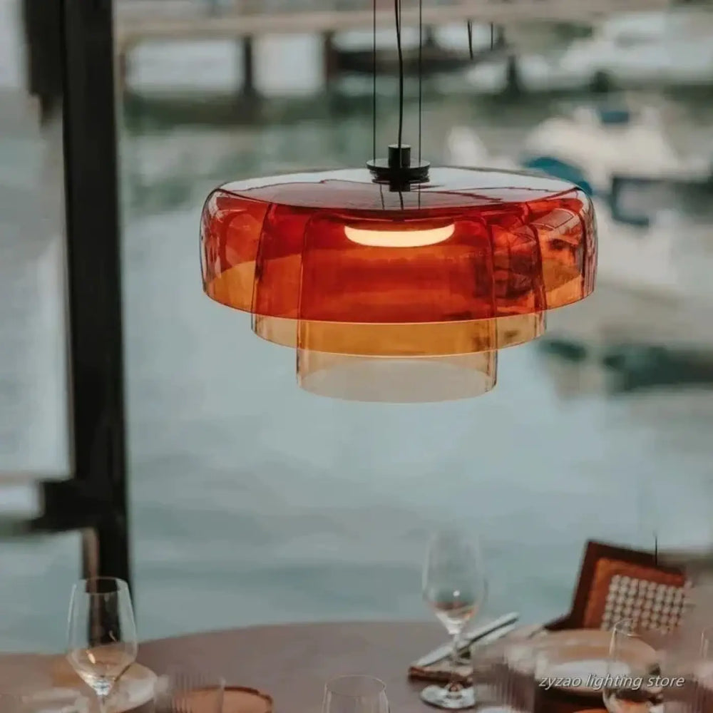Suspension luminaire zaoh moderne avec verre teinté ambre translucide et éclairage intérieur chaud, objet décoratif élégant