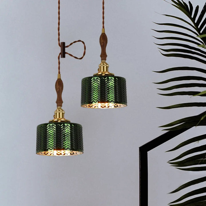 Suspension vert foncé avec détail cuivre et bois chic