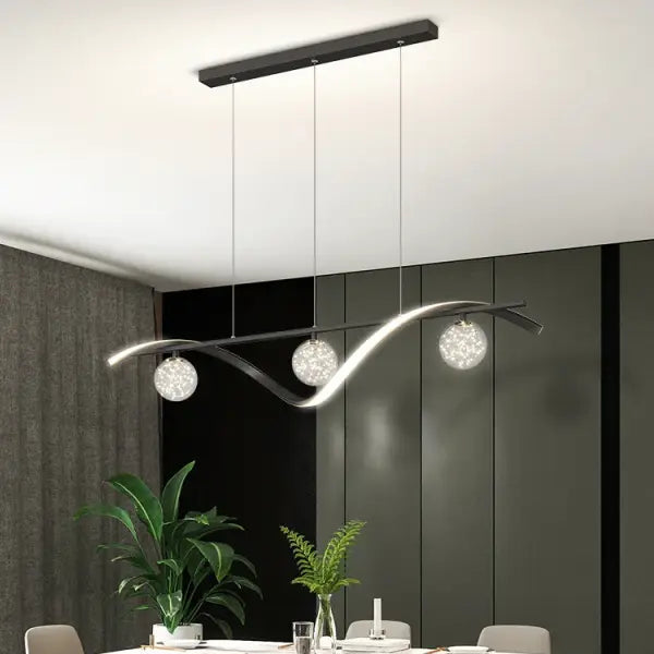 Suspension moderne à vague métallique et boules lumineuses

