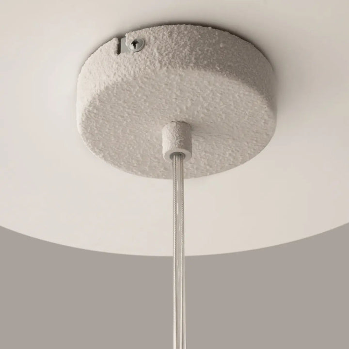 Suspension luminaire opus wabi-sabi blanc texturé avec tige métallique volume irrégulier et lumière douce