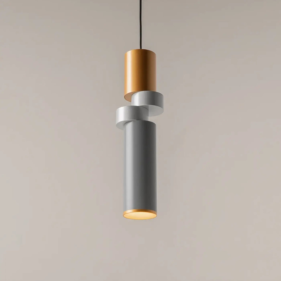 Suspension palette moderne avec sections cylindriques empilées en verre gris mat et disque cuivré brossé