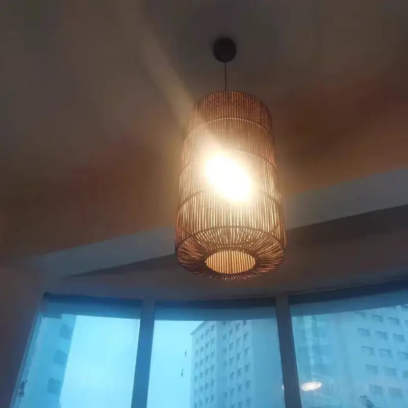 Suspension en rotin naturel cylindrique design bohème