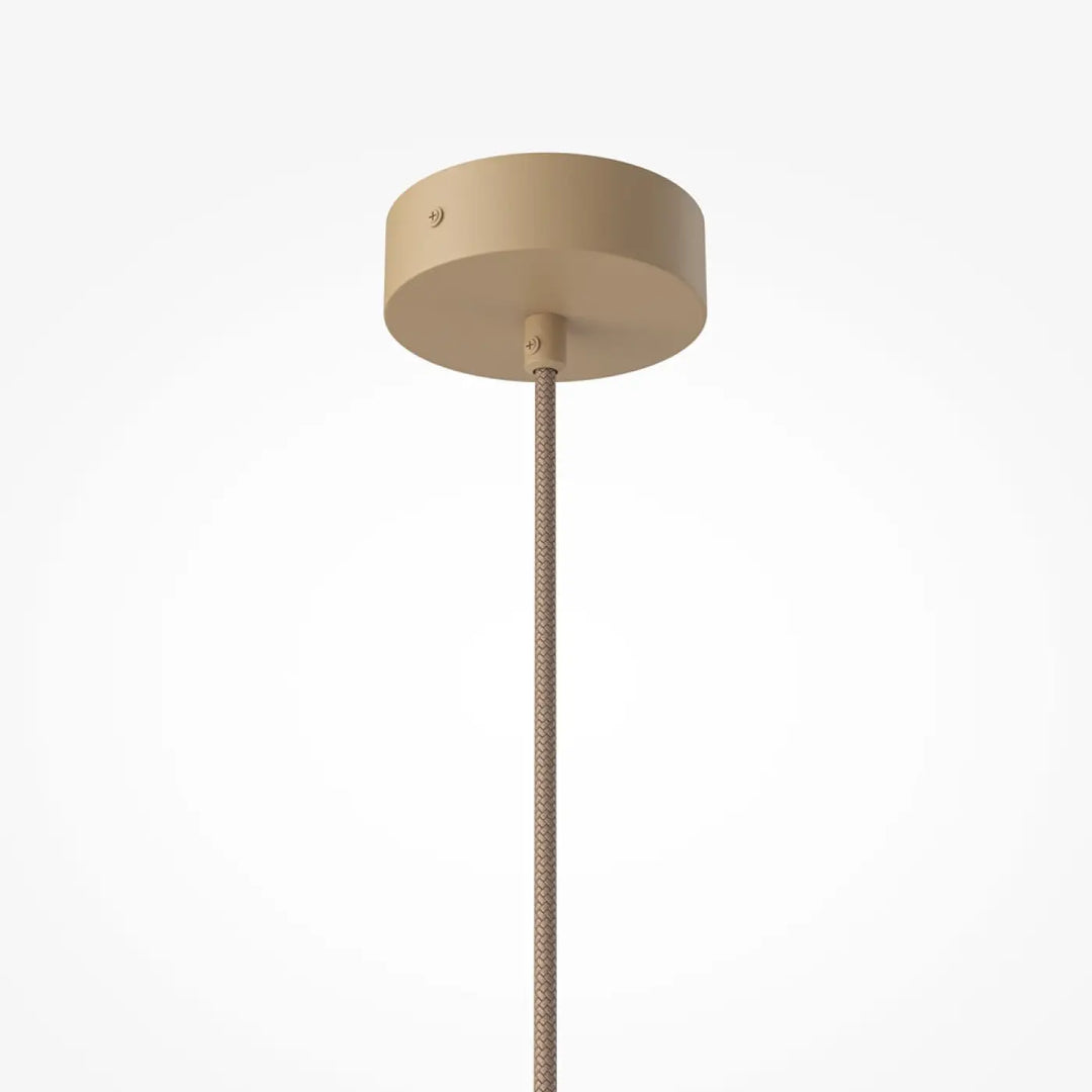 Suspension tavo beige cylindrique avec cordon tressé texturé pour une touche minérale au-dessus d’une table