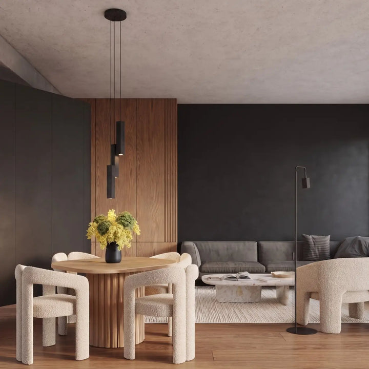 Suspension Rayo noire à tube cannelé au-dessus d'une table à manger