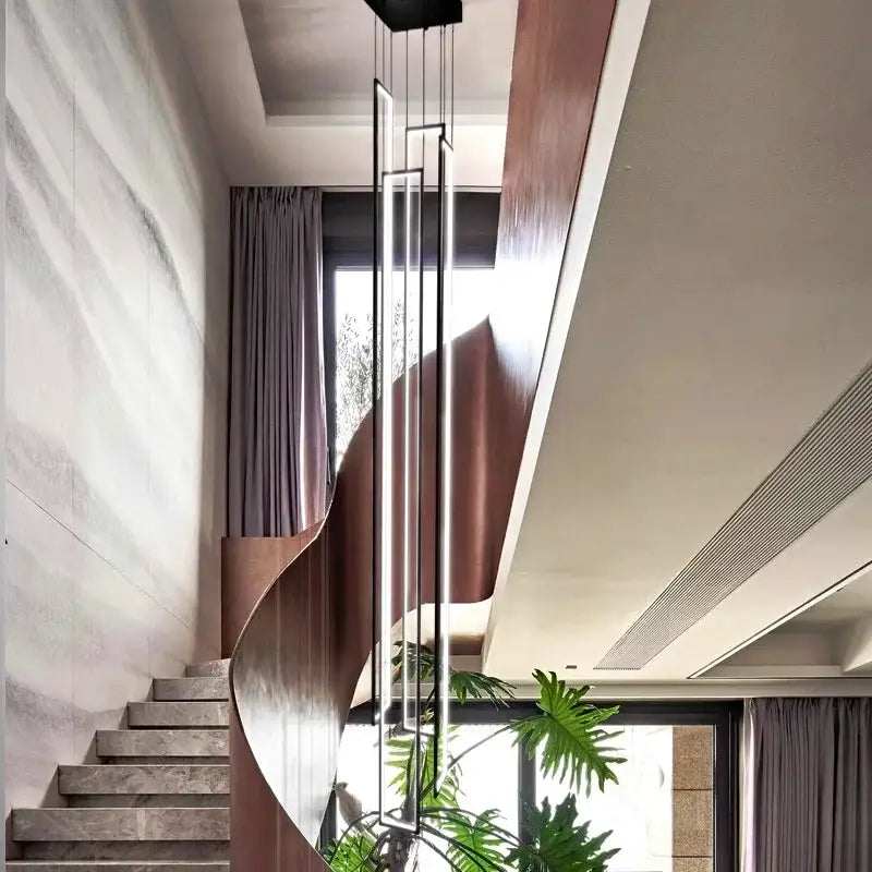 Suspension verticale noire avec cadres LED pour escalier
