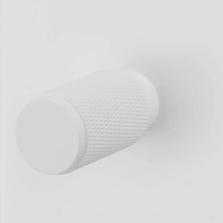 Détail du variateur Dimmer à gravure quadrillée blanc #couleur_blanc
