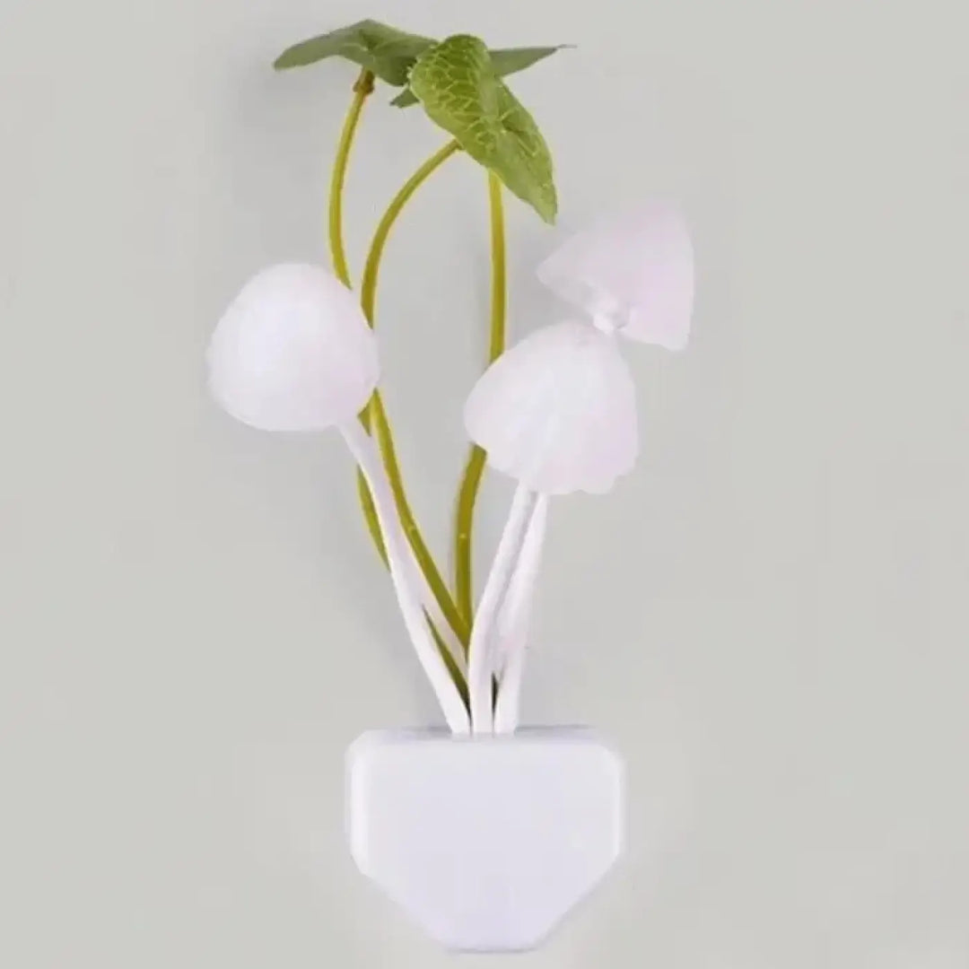 Veilleuse champignon led en plastique blanc avec tiges feuillues vertes et base hexagonale par vouni